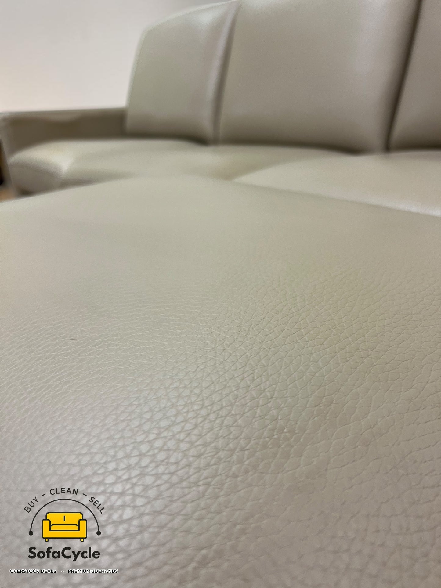 3-zit taupe in echt leder met poef – tweedehands