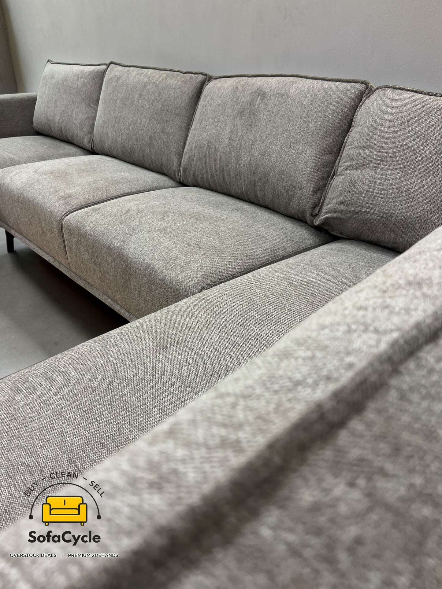 U-zetel grijs in stof – overstock