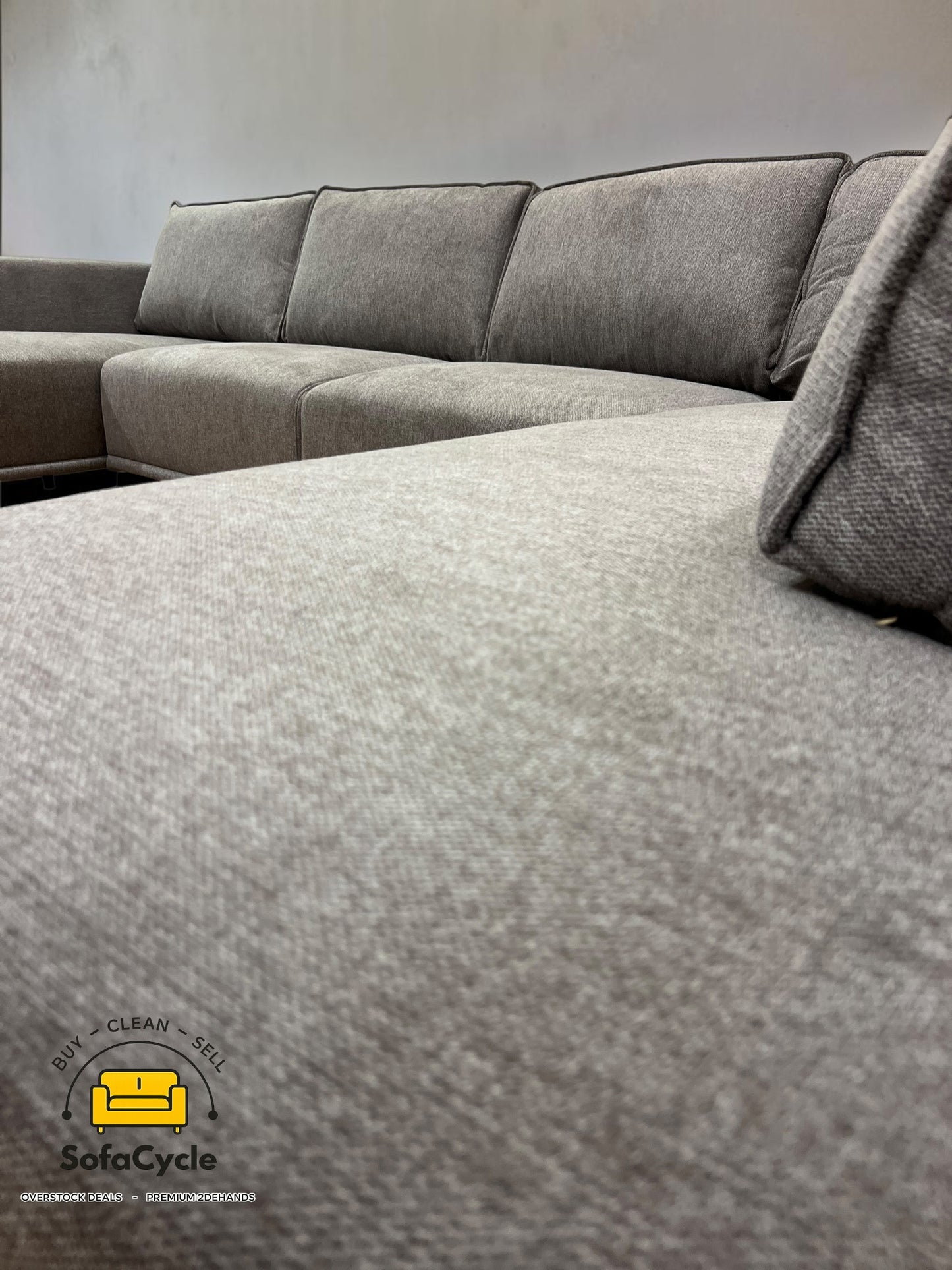 U-zetel grijs in stof – overstock